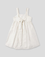 Vestido de tiras con textura tejida y lazos en espalda para niña