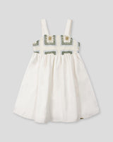 Vestido de tiras con textura tejida y lazos en espalda para niña