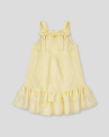 Vestido amarillo con moños y estampado floral para niña