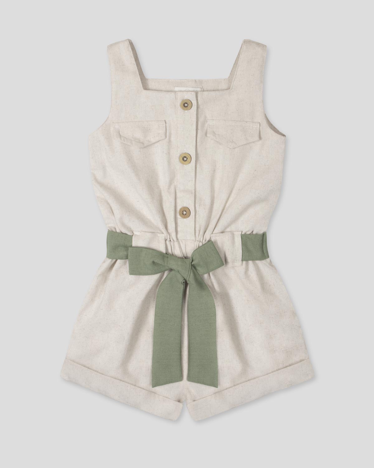 Enterizo en lino con botones y cinturón verde para niña