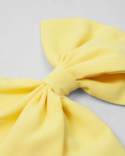 Moño pinza amarillo para niña