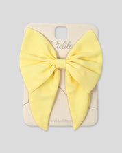 Moño pinza amarillo para niña