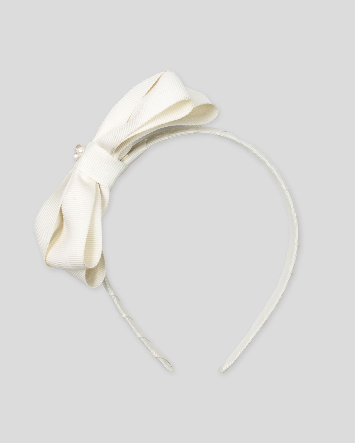 Diadema blanca con moñito para niña