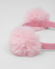 Diadema rosa con pompones para niña