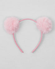 Diadema rosa con pompones para niña