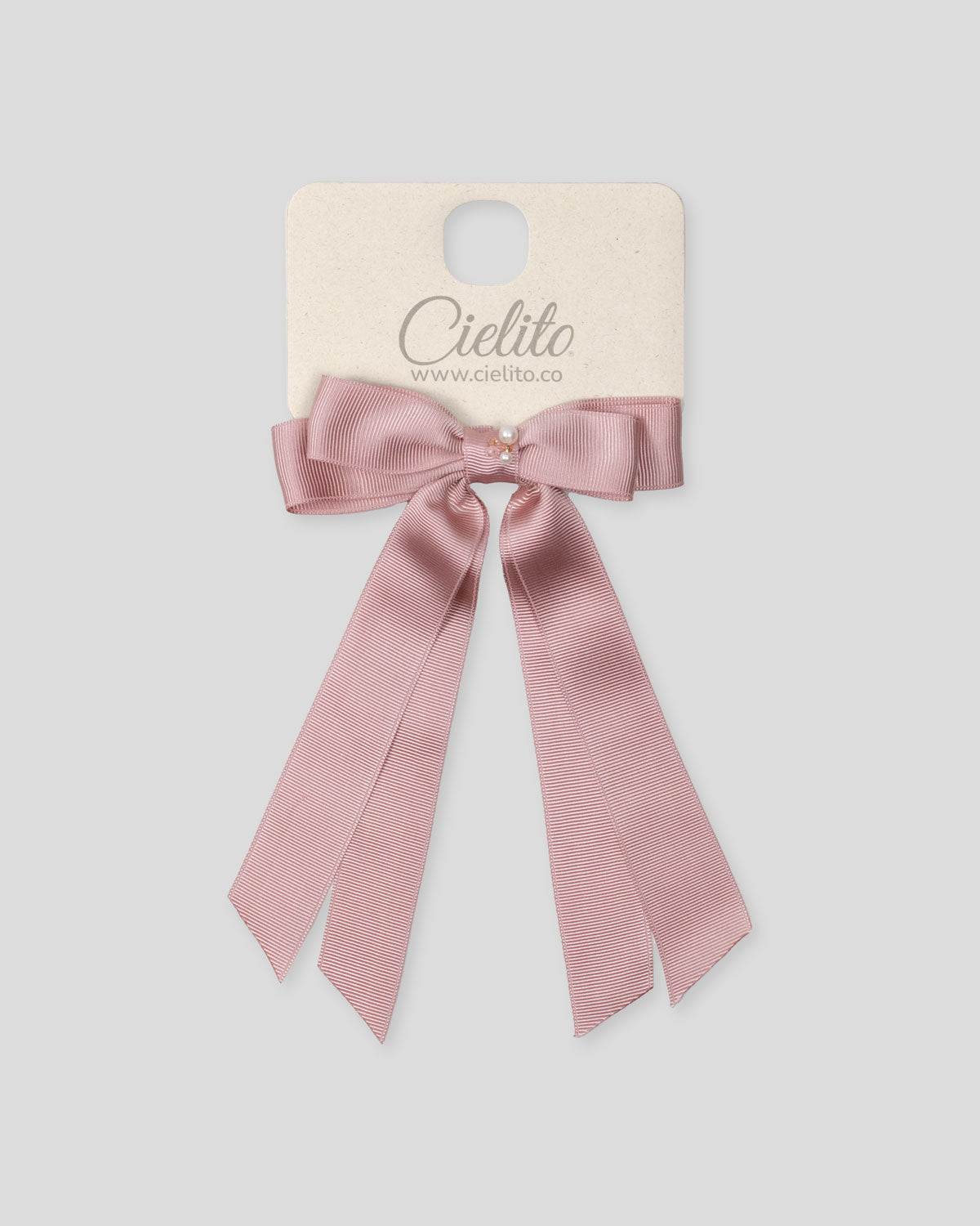 Moño pinza de cintas satinadas palo de rosa