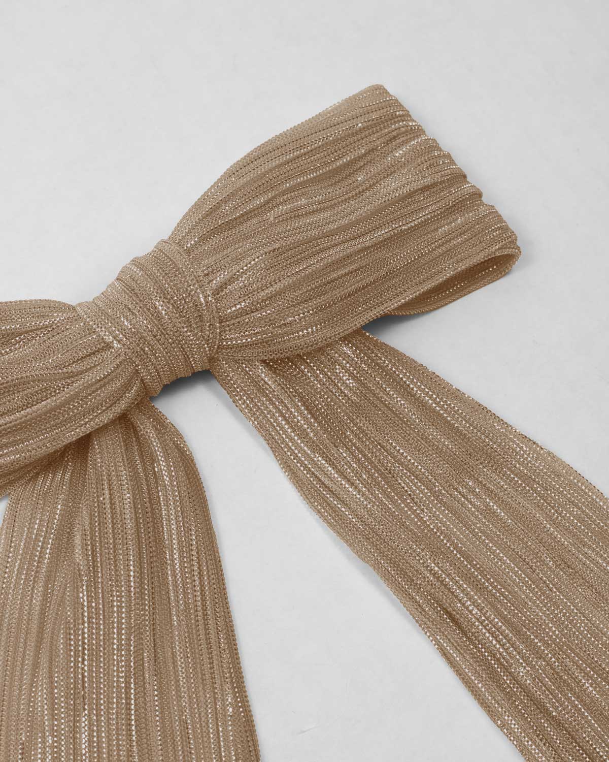 Moño dorado plisado con brillos para niña