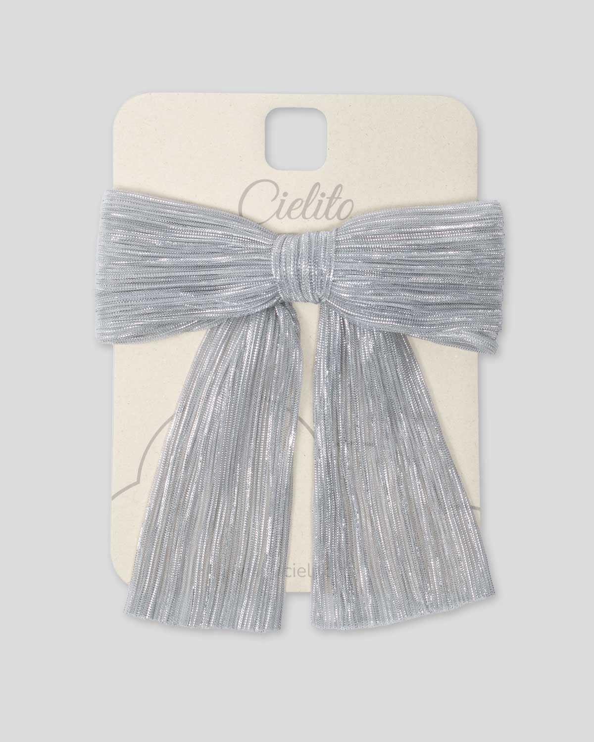 Moño plateado plisado con brillos para niña