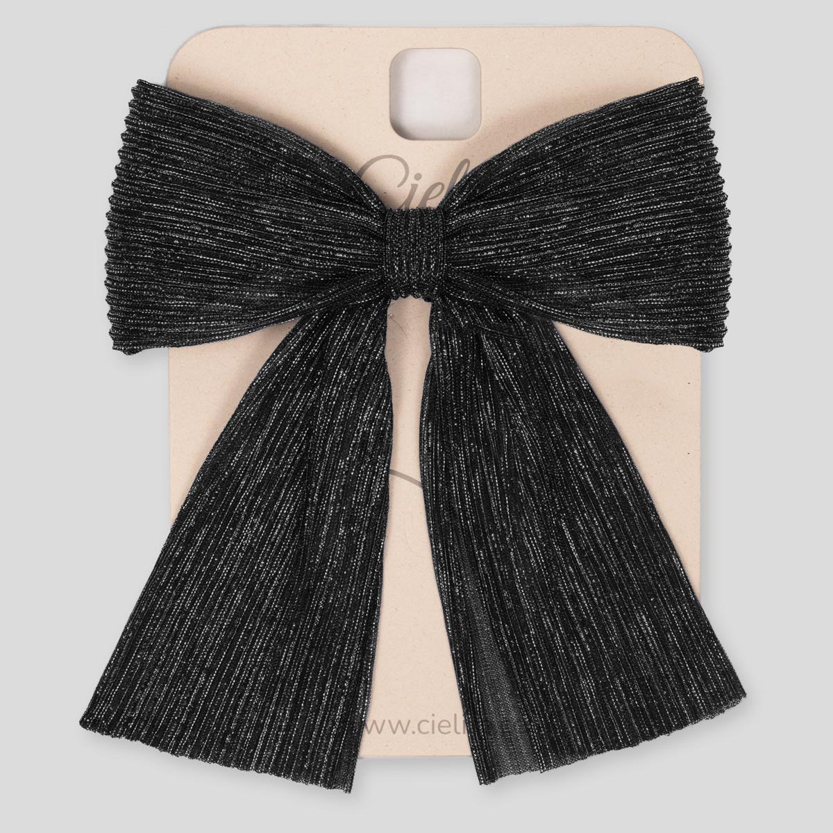 Moño pinza negro plisado con brillos para niña