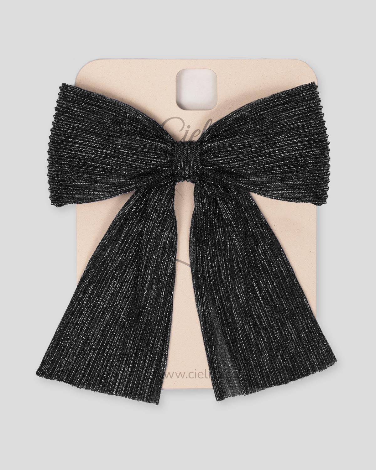 Moño pinza negro plisado con brillos para niña