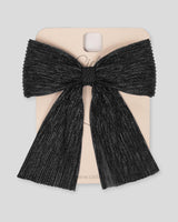 Moño pinza negro plisado con brillos para niña