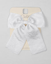 Moño pinza en seda blanco para niña