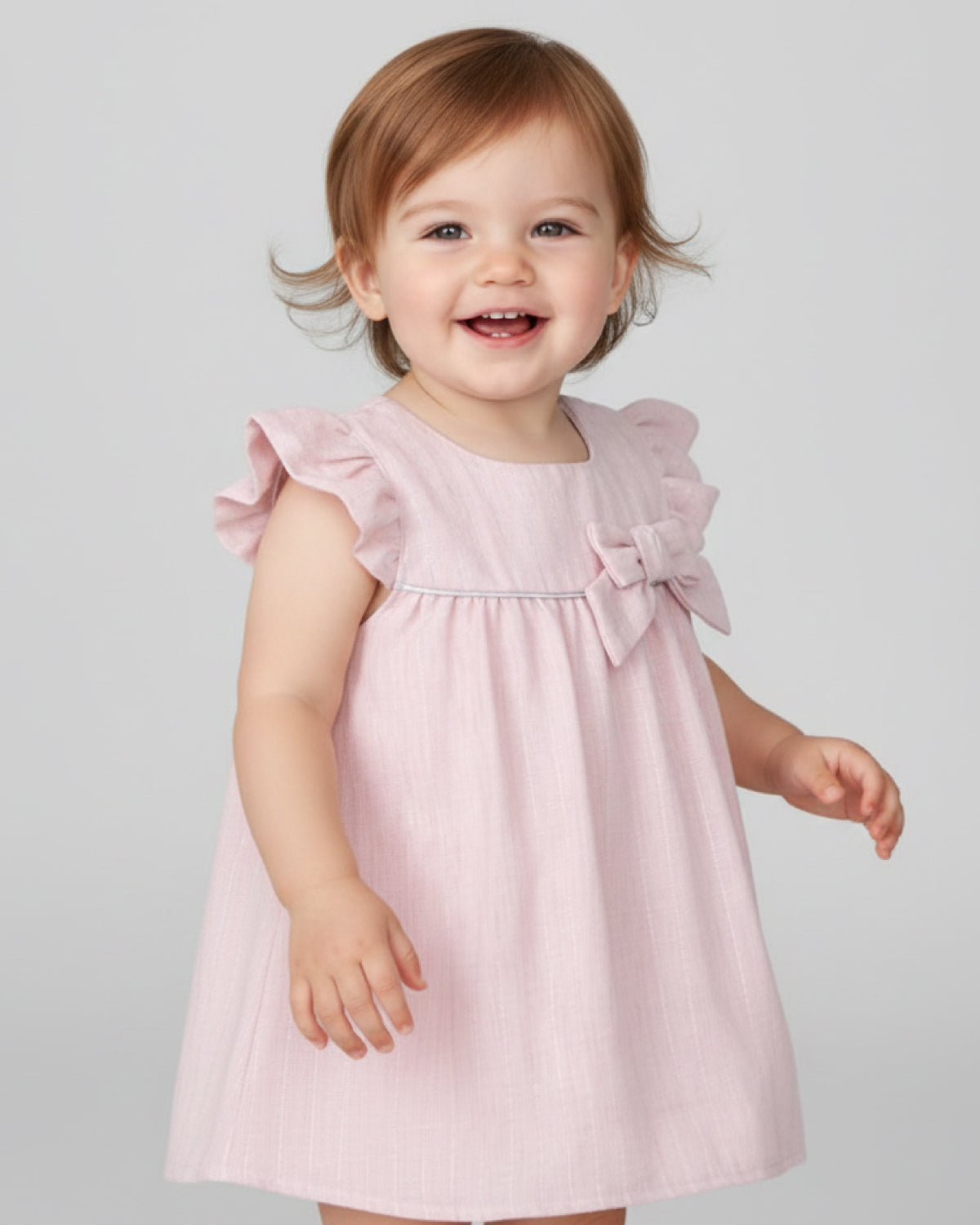 Vestido body rosa pastel con moño y brillos para bebé niña