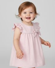 Vestido body rosa pastel con moño y brillos para bebé niña