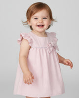 Vestido body rosa pastel con moño y brillos para bebé niña