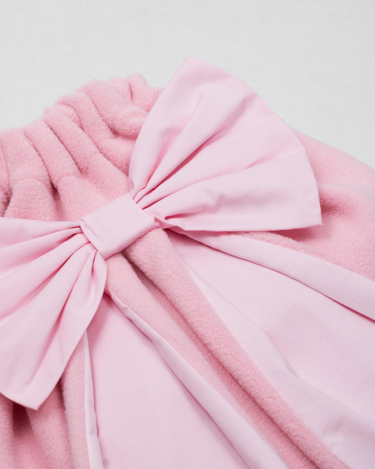 Tula rosa con moñito y orejitas de conejo