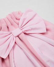 Tula rosa con moñito y orejitas de conejo