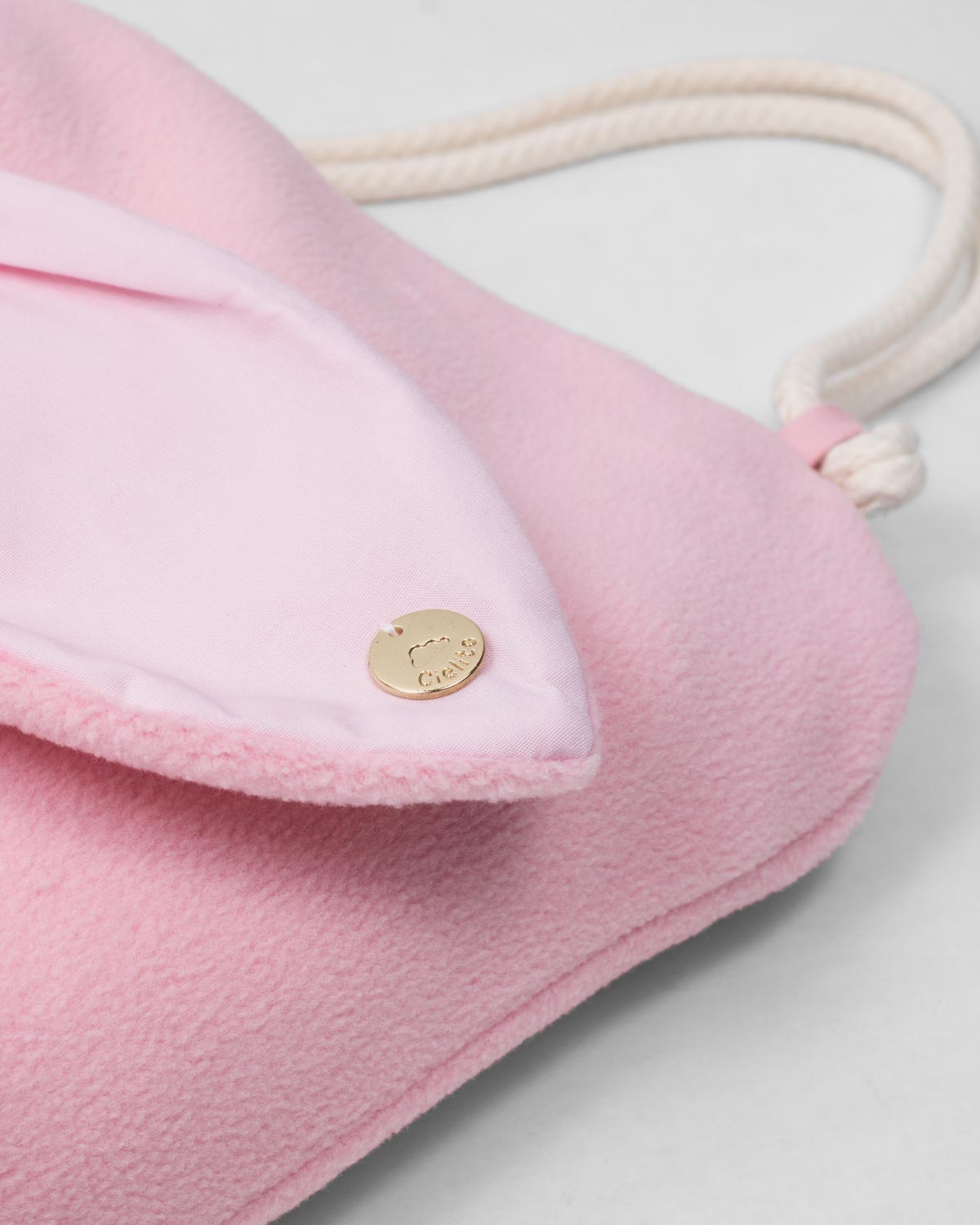 Tula rosa con moñito y orejitas de conejo