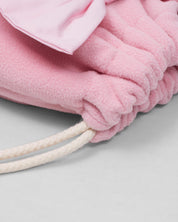 Tula rosa con moñito y orejitas de conejo
