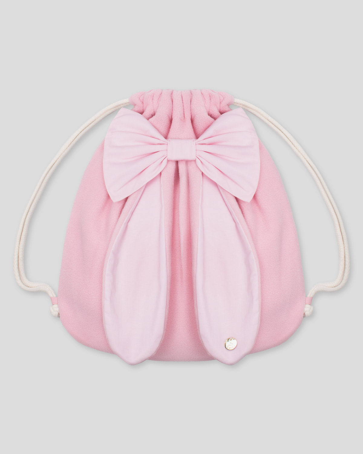 Tula rosa con moñito y orejitas de conejo