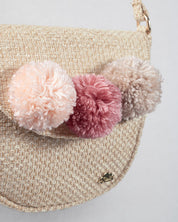 Bolso tejido con pompones y botón de imán para niña