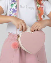 Bolso corazón con pompón para niña