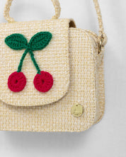 Bolso tejido con cerezas y botón de imán para niña