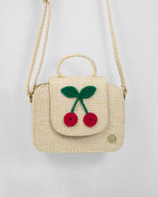 Bolso tejido con cerezas y botón de imán para niña