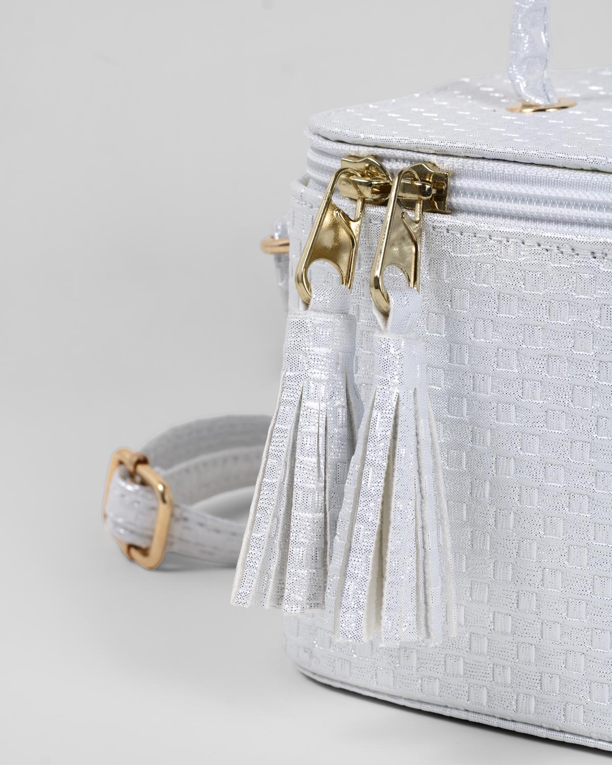 Bolso mini neceser plateado para niña