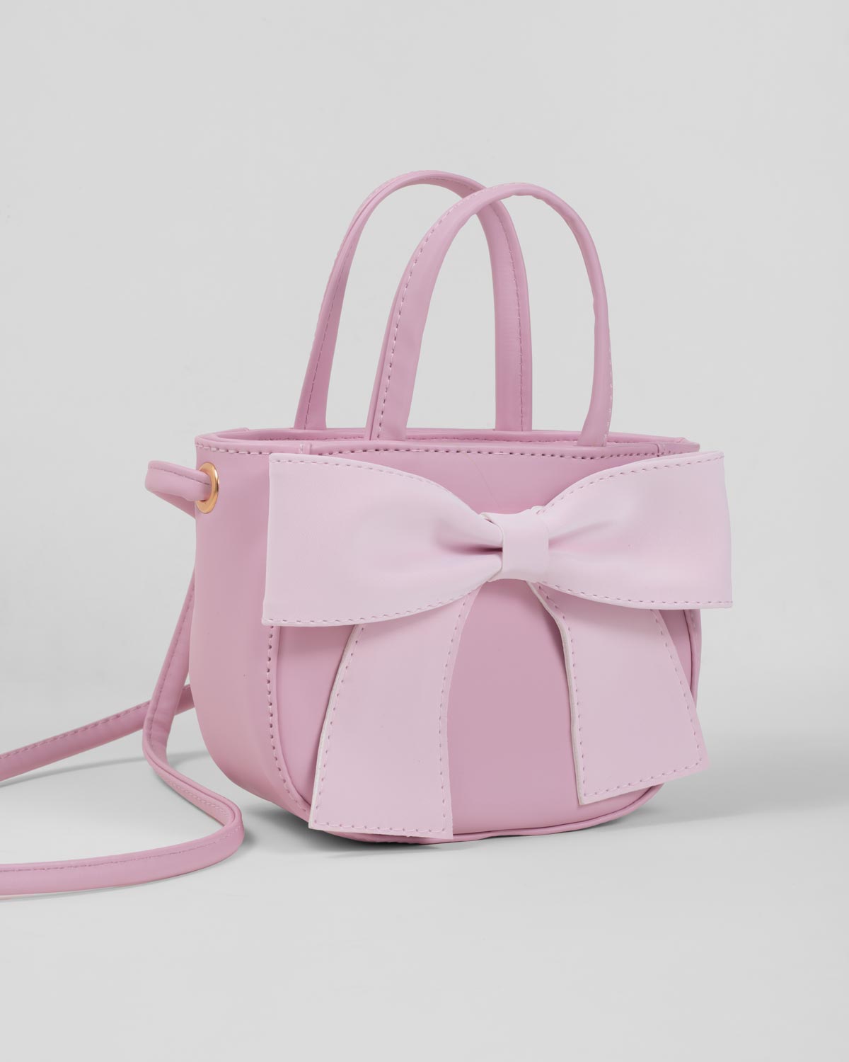 Bolso rosa con moño para niña