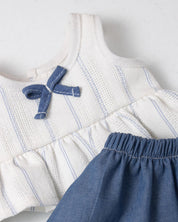 Conjunto blusa blanca con moñito y falda azul para peluche