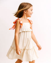 Vestido en lino de tiras con moños y boleros para niña