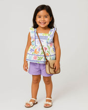 Total look de conjunto, bolso y sandalias para niña.