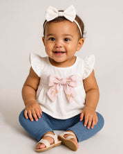 Total look de conjunto y set de balaquitas para bebé niña.