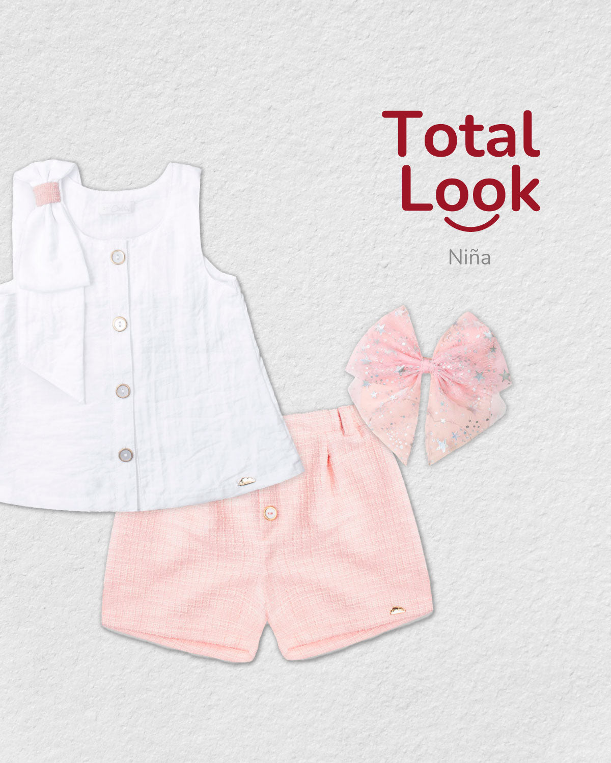 Total look con conjunto y moño pinza rosa para niña