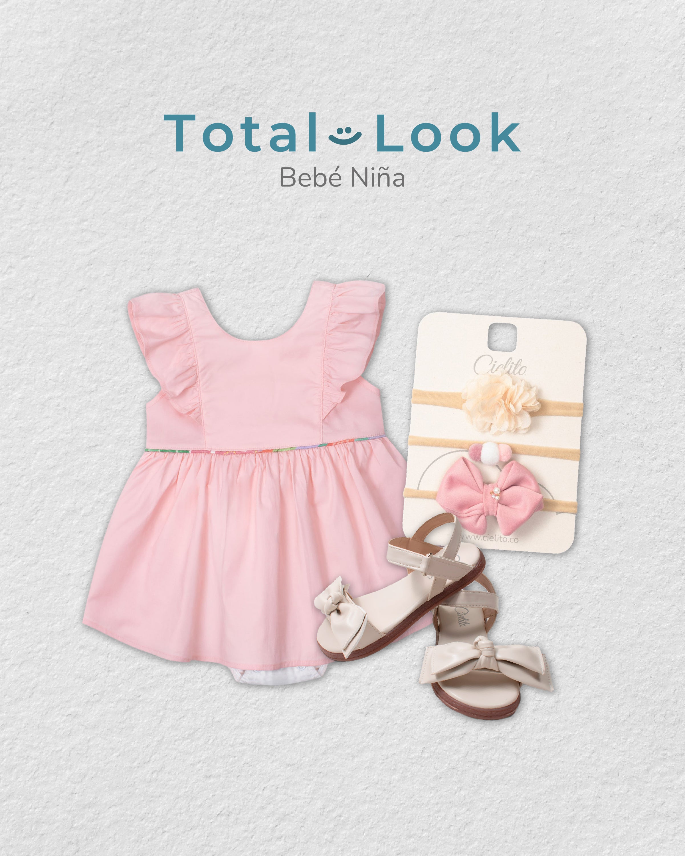 Total look de vestido rosa, balacas y sandalias para bebé niña.