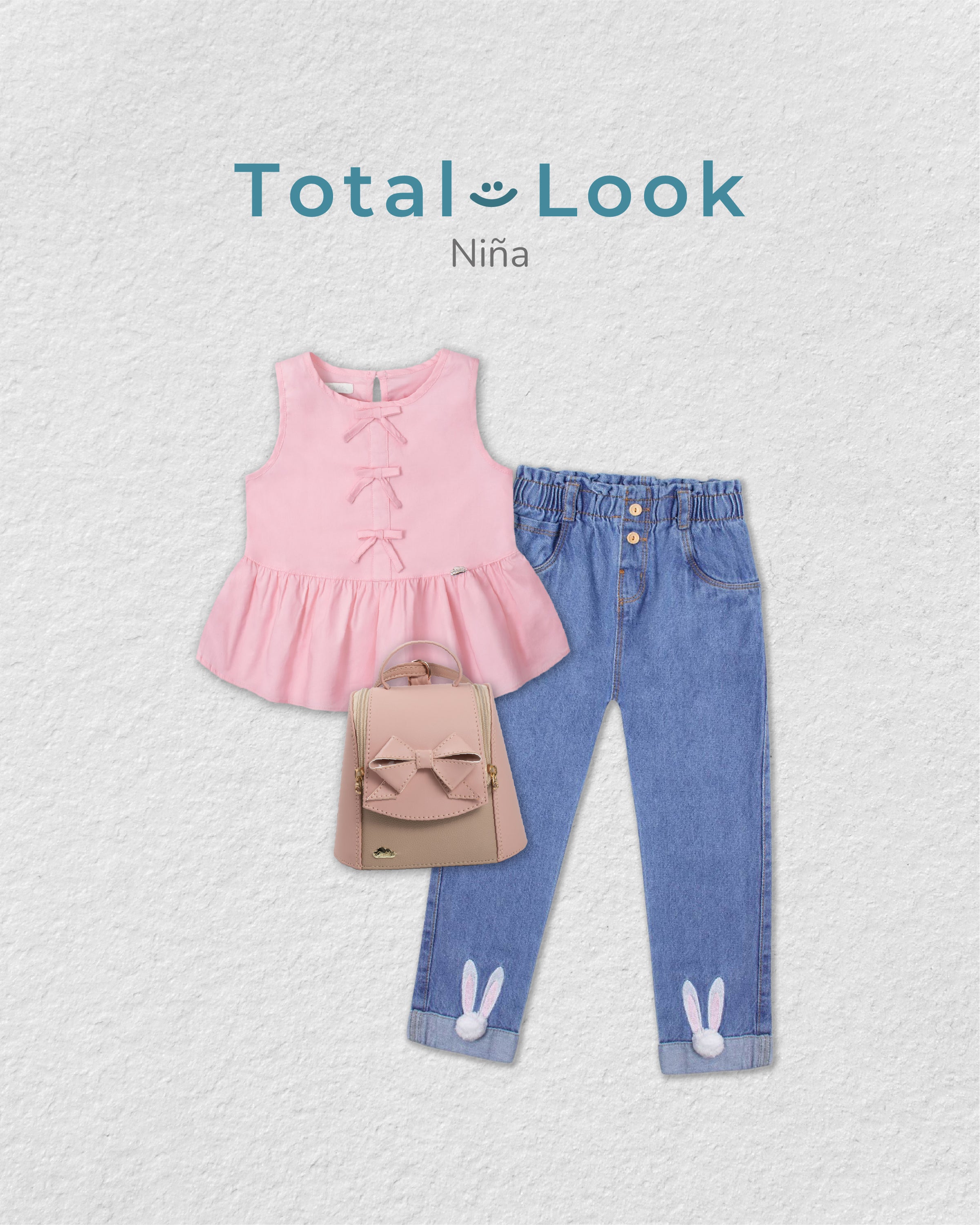 Total look de bolso, blusa y jean para niña.