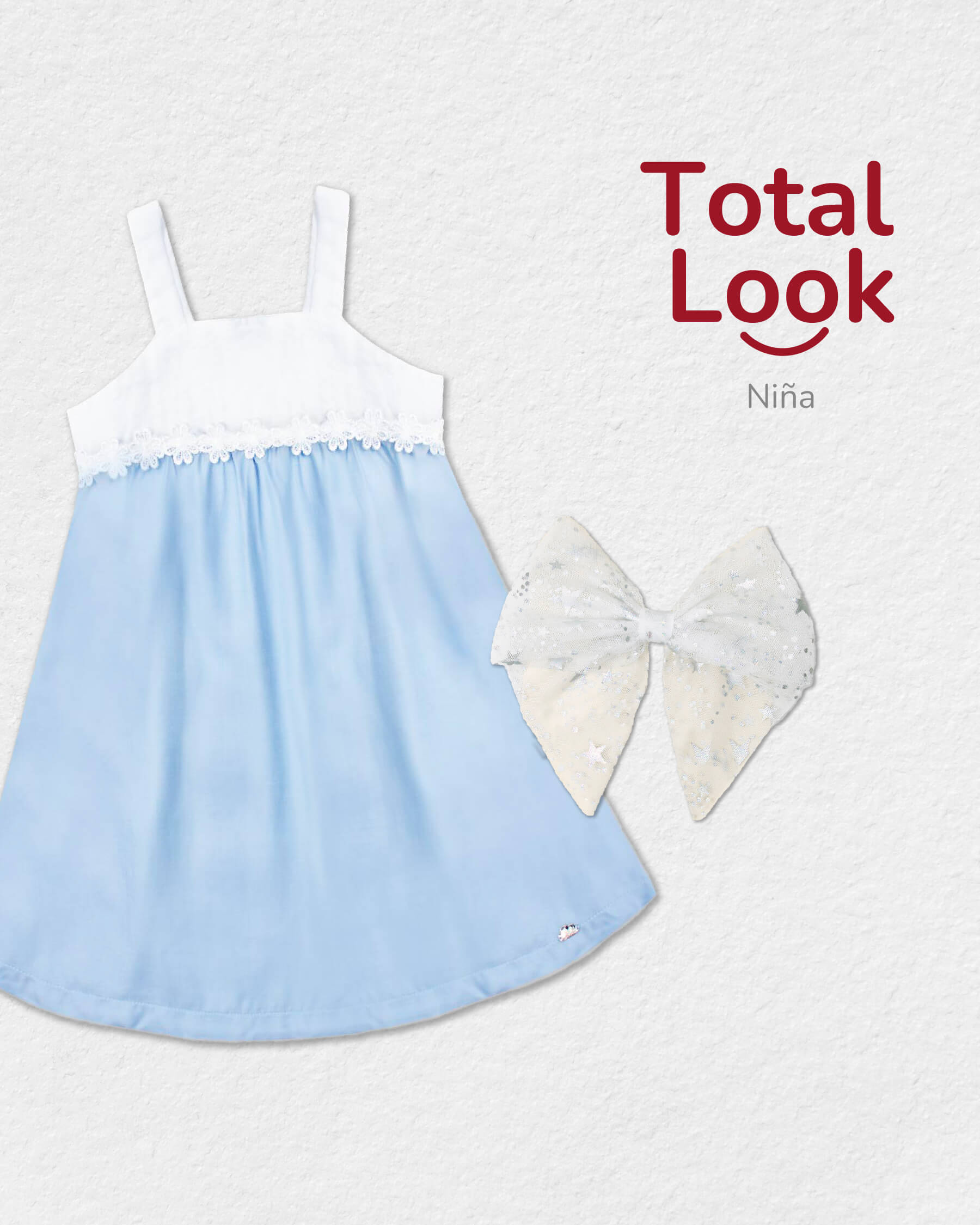 Total look con moño y vestido azul para niña