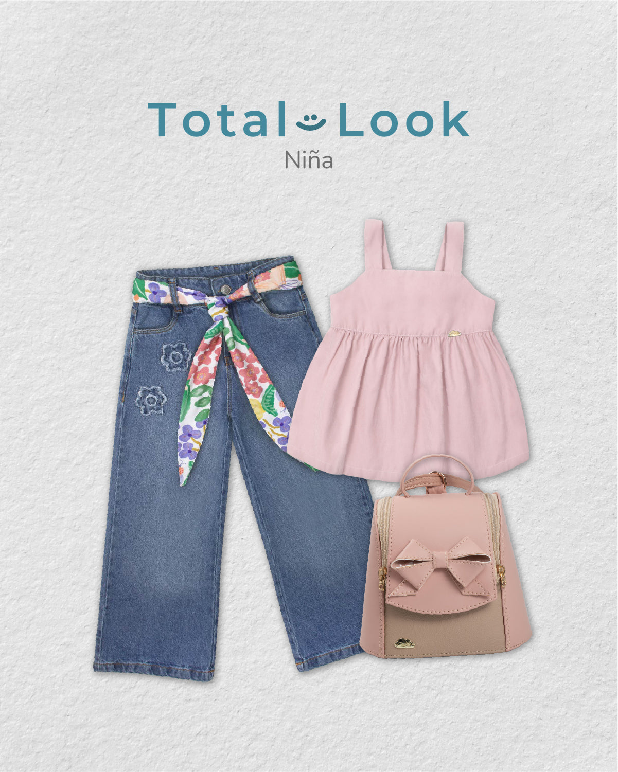 Total look con bolso, blusa y jean para niña.