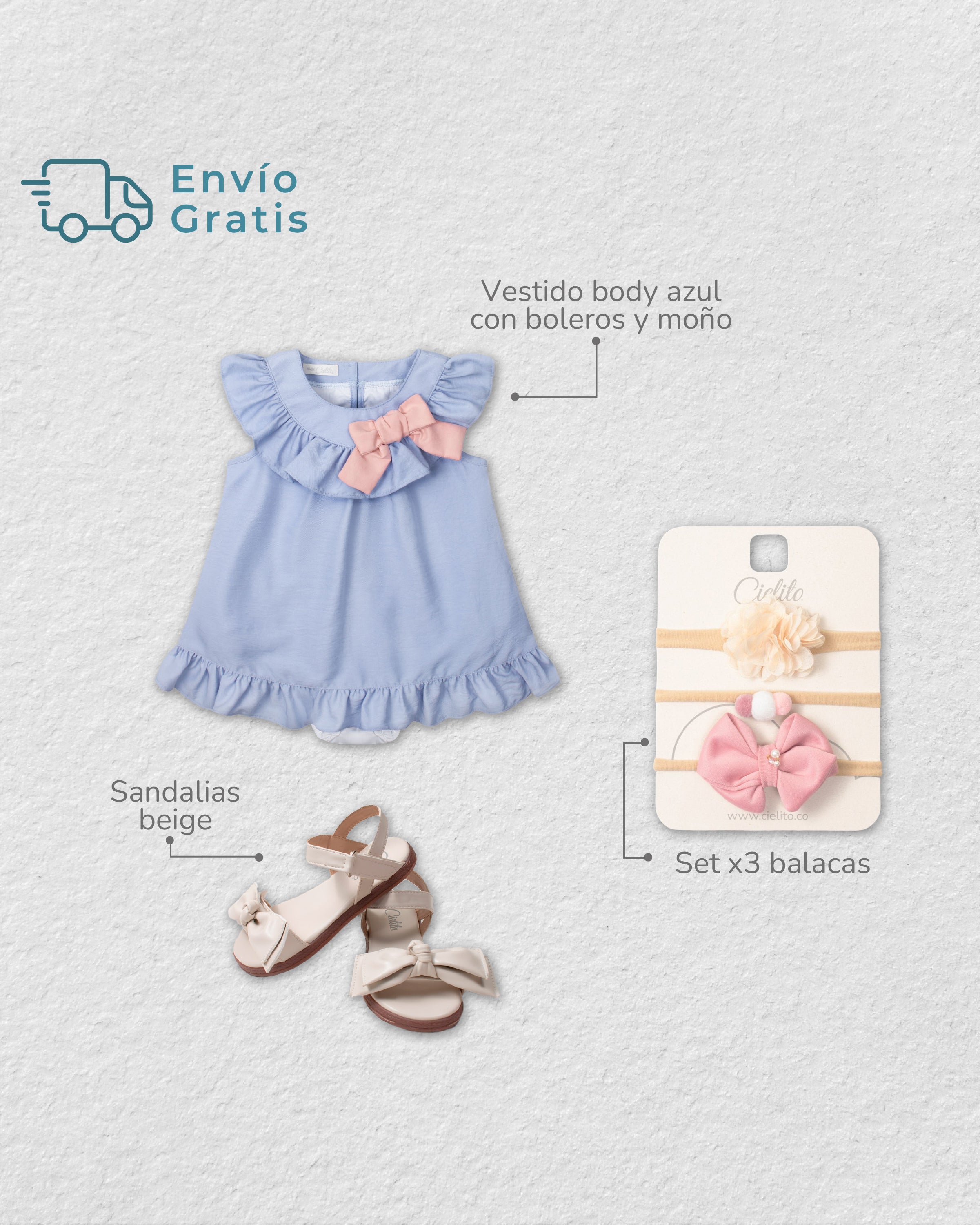 Total look de vestido azul, set de balacas y sandalias para bebé niña.