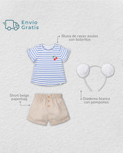 Total look con diadema, camisa azul y short para niña.