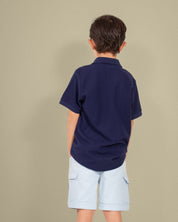 Camisa polo pique algodón azul navy para niño