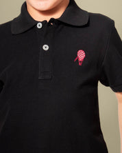 Camiseta polo pique algodón negro para niño