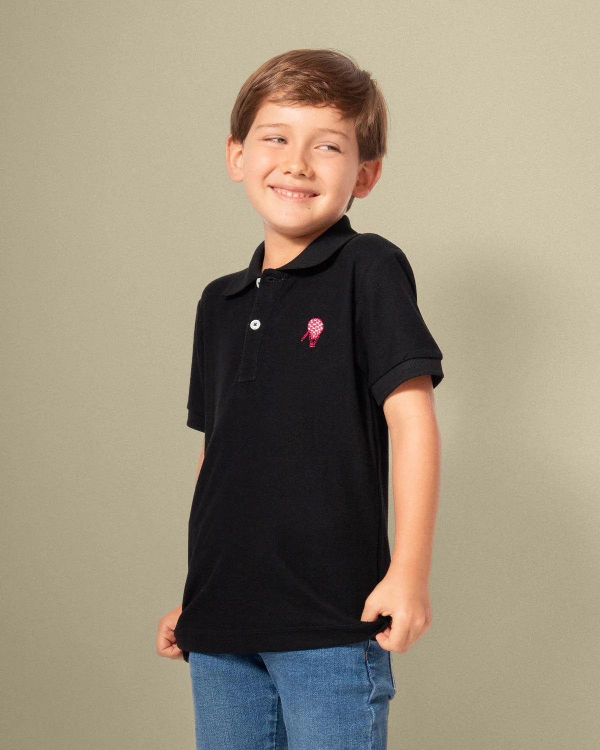 Camiseta polo pique algodón negro para niño