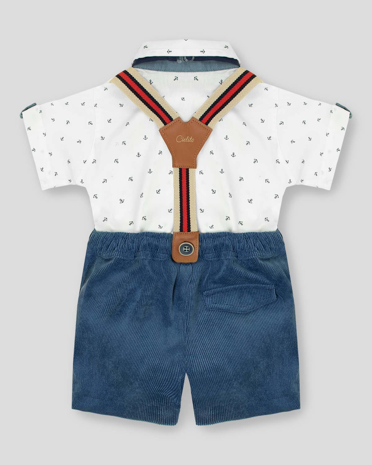Conjunto camisa tipo body blanco con short azul y cargaderas para bebé niño