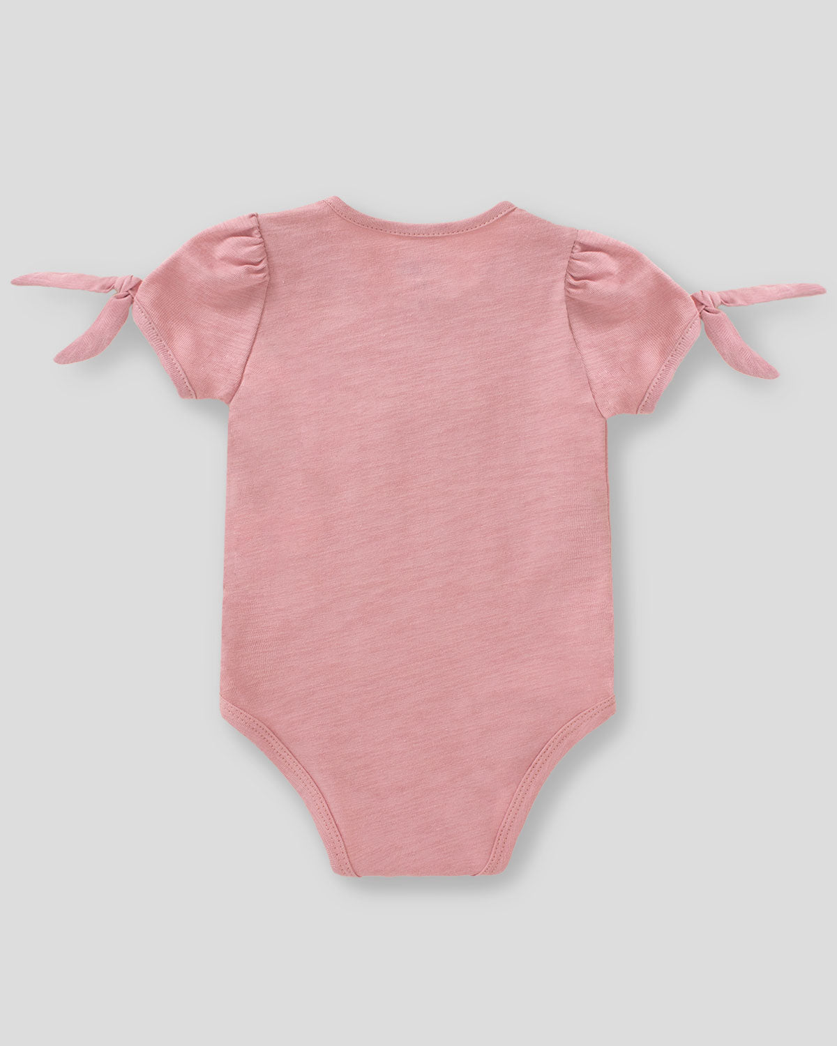 Body rosado con estampado y aplique de flores para bebé niña