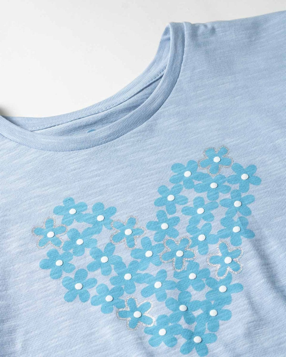 Camiseta azul con estampado de flores y nudo para niña - Cielito