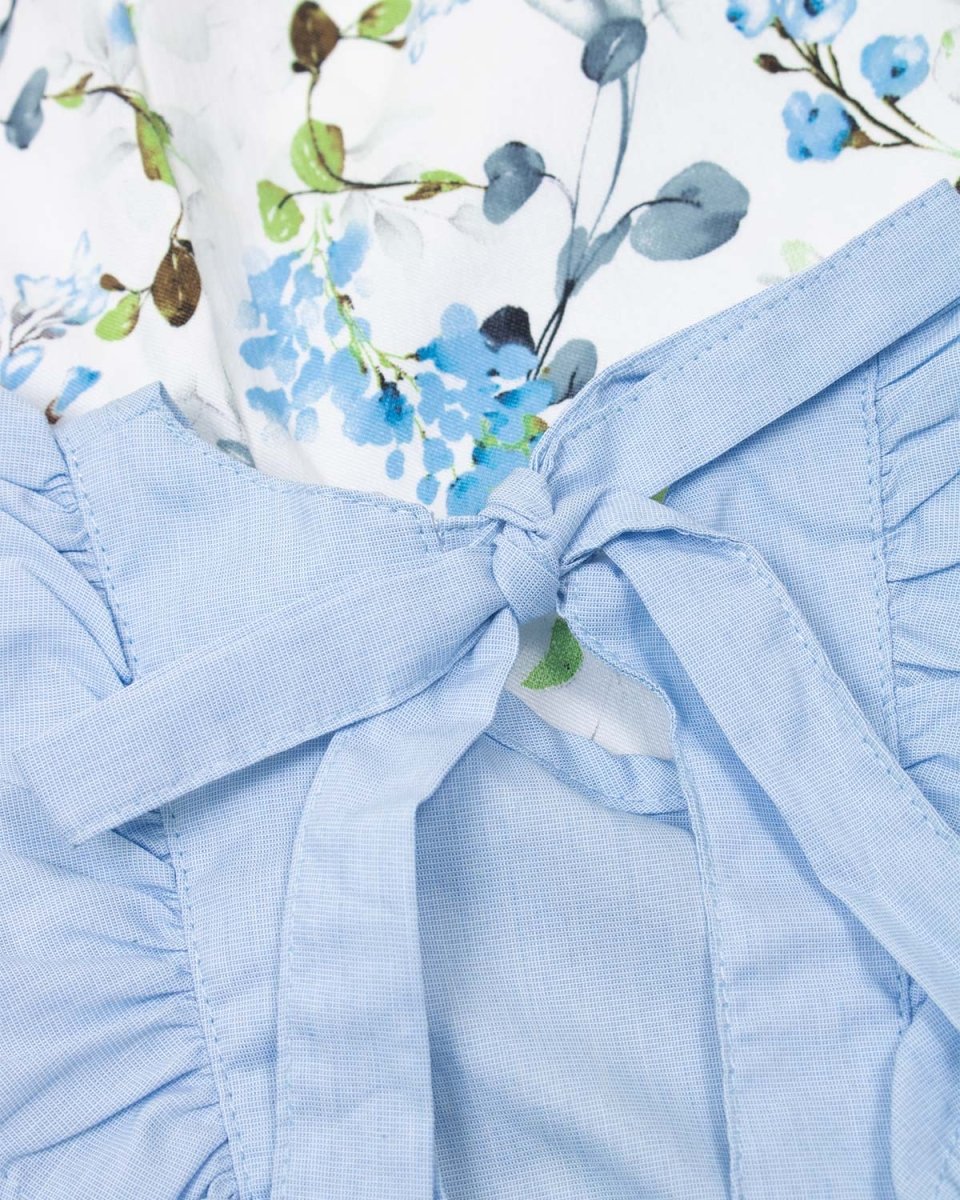 Conjunto blusa azul con boleros y leggins blanco con flores verdes y azules para niña - Cielito