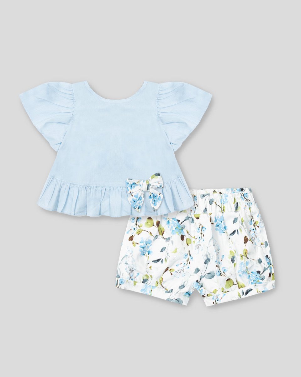 Conjunto blusa azul con boleros y moño blanco de flores para bebé niña - Cielito