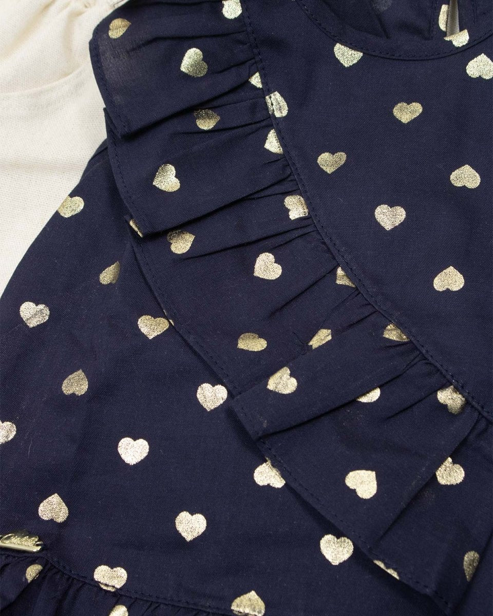 Conjunto blusa azul oscuro de corazones dorados con short crema con botones dorados para niña - Cielito